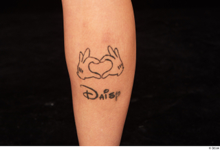 Daisy Lee calf nude tattoo 0001.jpg